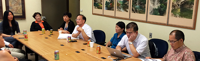 Officials from China, who direct key research offices about Zhou Enlai, meet with officials from the University of Hawaii, Honolulu.